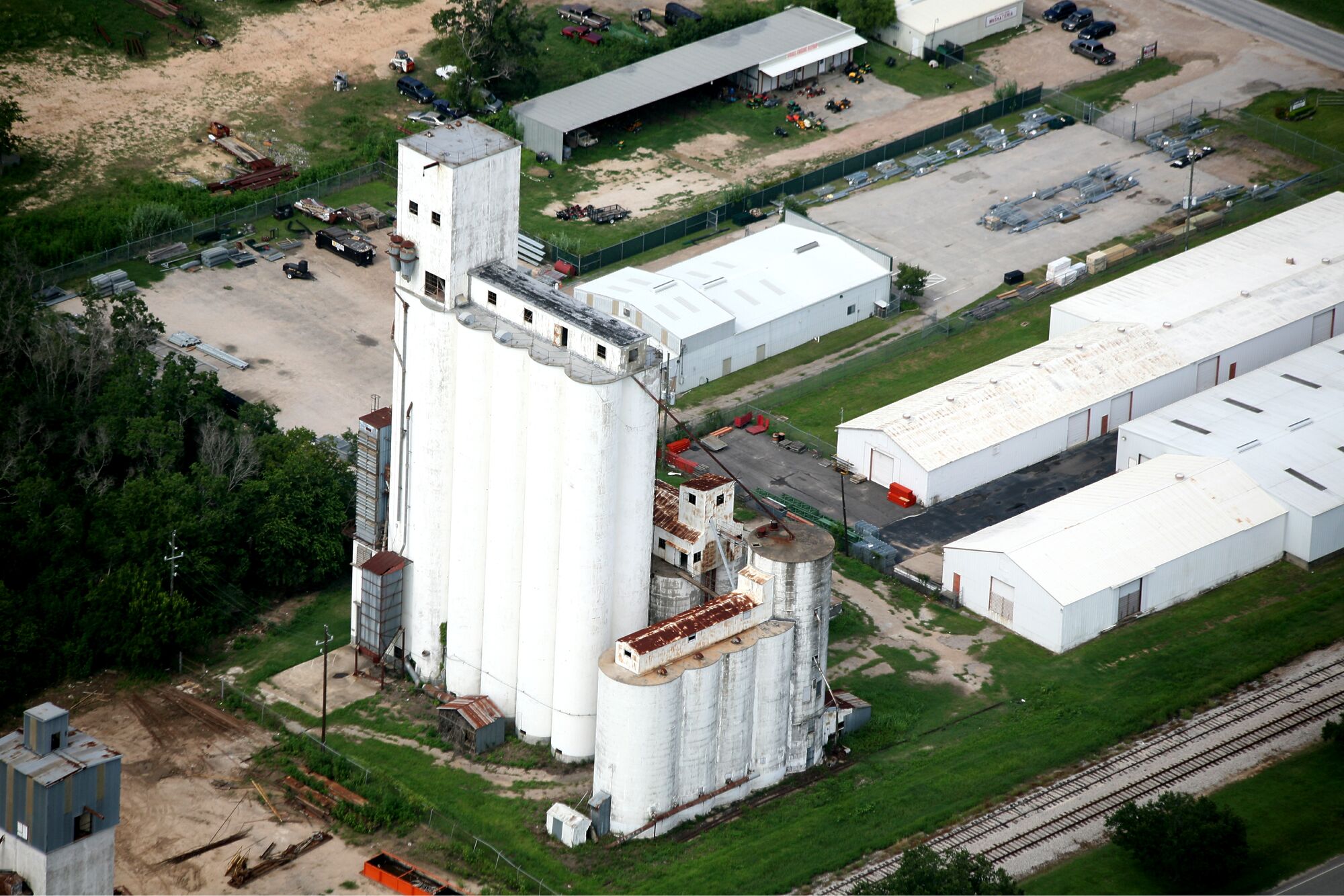Aerial view of the whole site: the rice dryers, the beer garden and the train yard