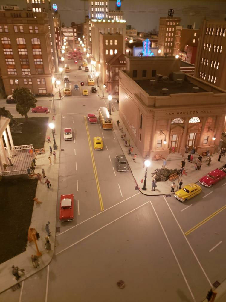 A model train layout with miniature buildings at the Centreville exhibit