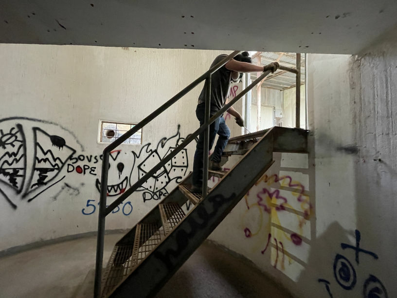 The old steel stairwell inside the dryer, before restoration